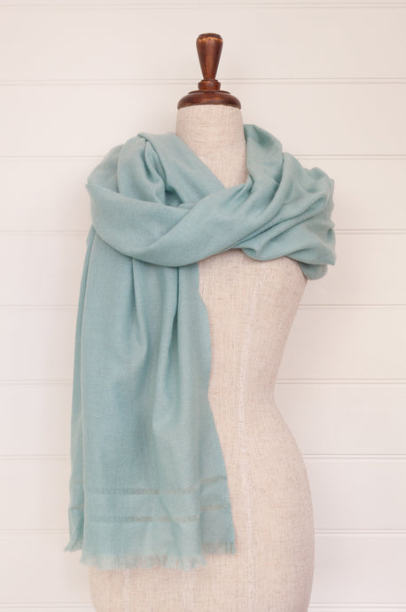 Juniper Hearth woven cashmere scarf featuring fagoting detail and fringed at ends, in soft duck egg blue..