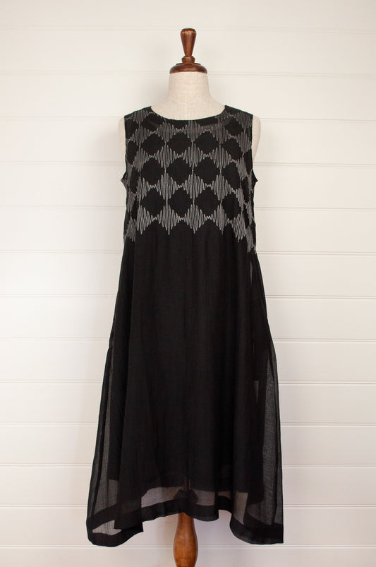 Neeru Kumar Pedro dress - embroidered cotton silk, white on black. A line sleeveless dress includes slip.