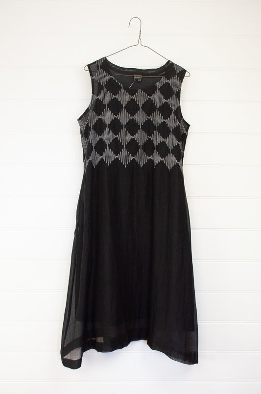 Neeru Kumar Pedro dress - embroidered cotton silk, white on black. A line sleeveless dress includes slip.