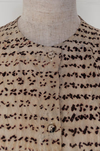 Raga Betony silk shibori shirt, natural black on natural linen, collarless button up, three quarter sleeves, pin tucked back yoke (close up).