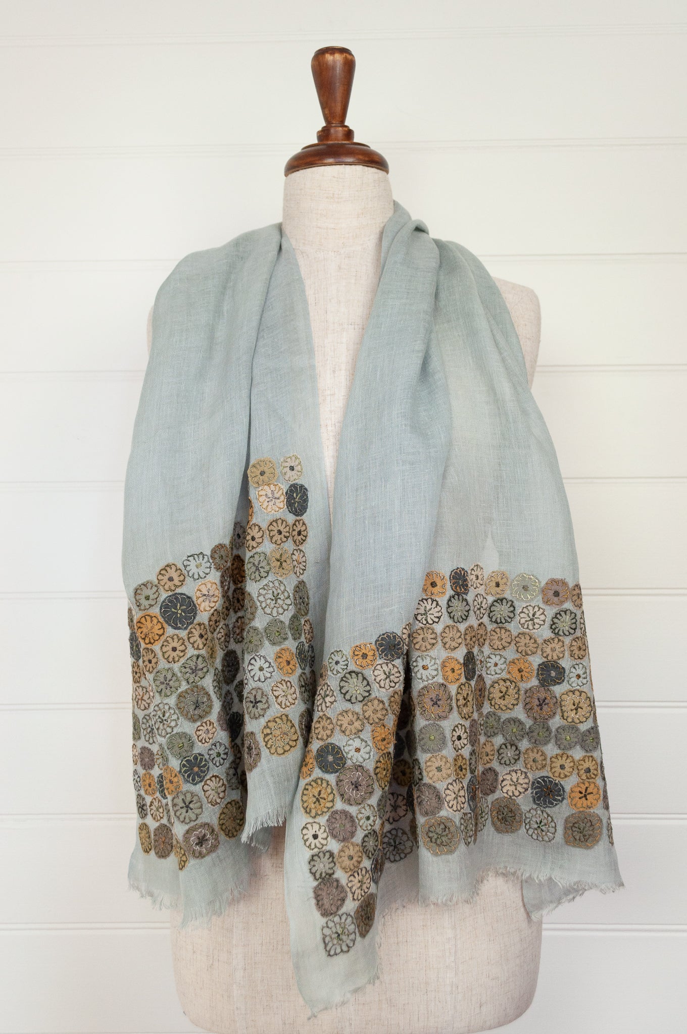 Sophie Digard embroidered linen stole scarf Eng soft blue with applique floewrs in grey, mustard and rust.