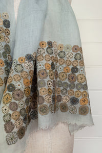 Sophie Digard embroidered linen stole scarf Eng soft blue with applique floewrs in grey, mustard and rust.