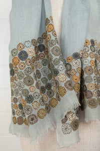 Sophie Digard embroidered linen stole scarf Eng soft blue with applique floewrs in grey, mustard and rust.