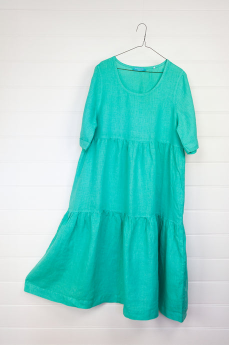 Haris Cotton made in Greece Island Green mint green tiered short sleeved linen midi length dress.