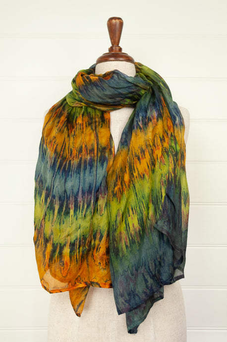 Juniper Hearth digital print tie dye multi stripe rust, smoke blue, lime green.