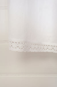 Lace edged cotton slip - white