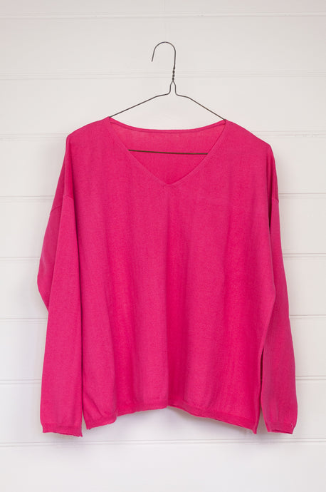 One size V-neck slouchy cashmere cotton summer sweater in bright rose pink.