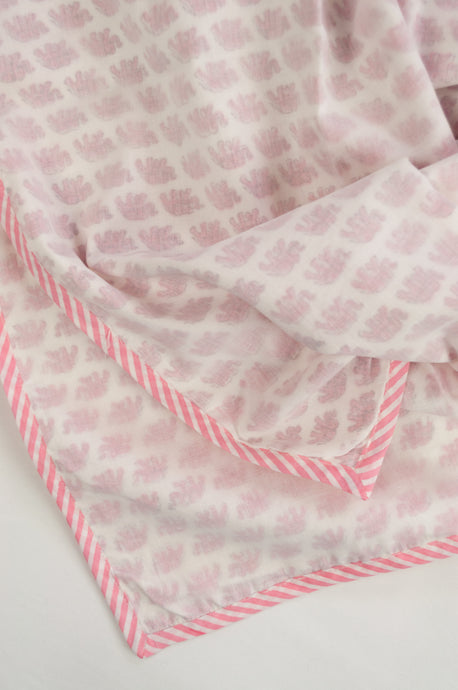 Summer baby quilt dohar lightweight muslin cotton voile quilt, block printed three layers, tiny pink elephants on white with striped border.