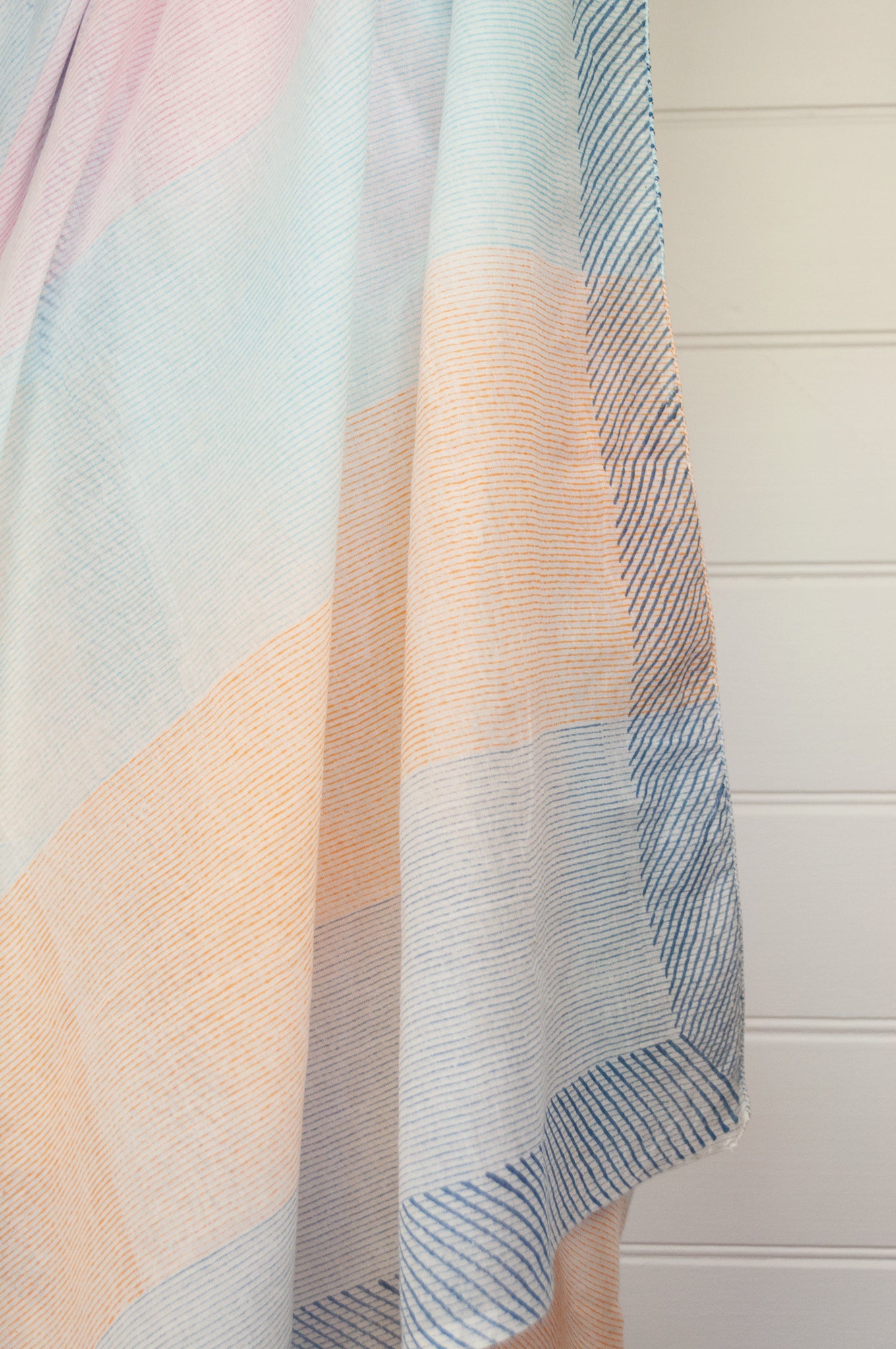 JH cotton voile sarong wrap scarf in teal floral with highlights in coral.