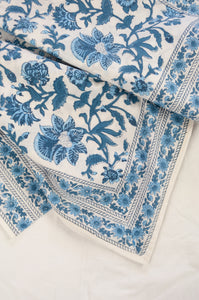 Cotton tablecloth, blockprinted by hand exclusively for Juniper Hearth, Mina floral in shades of denim blue on white.