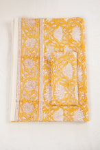 Load image into Gallery viewer, Cotton tablecloth, blockprinted by hand exclusively for Juniper Hearth, Sara floral in white on honey yellow.