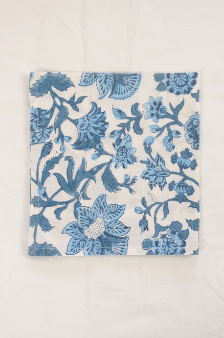 Cotton table napkins, blockprinted by hand exclusively for Juniper Hearth, Mina floral in shades of denim blue on white.