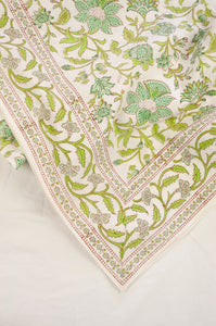 Cotton table cloth, blockprinted by hand exclusively for Juniper Hearth, Mina floral in turquoise and lime green on white.