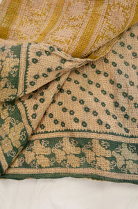 Vintage kantha quilt upcycled from cottonn saris, handstitched, in soft mustard yellow floral with magenta border, green and ecru floral on the reverse.