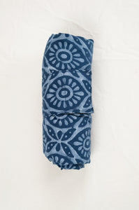 Juniper Hearth block print reusable rollable shopping eco bag, indigo floral pattern, rolled.