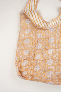 Juniper Hearth block print reusable rollable shopping eco bag, light mustard and white cornflower floral pattern.