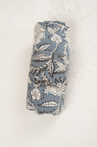 Juniper Hearth block print reusable rollable shopping eco bag, blue grey and white floral pattern, bag rolled.