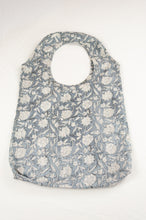 Load image into Gallery viewer, Juniper Hearth block print reusable rollable shopping eco bag, blue grey and white floral pattern.