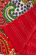 Load image into Gallery viewer, Handstitched cotton kantha quilt, a colourful paisley on a brilliant red background, with highlights in lime, emerald, turquoise, white, and tan