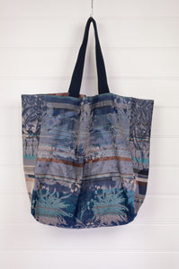Made in France organic cotton large reversible Létol tote bag features the beautiful Yvette design of flowers and checks in sapphire blue with brown and turquoise highlights on one side, with co-ordinating print on the reverse.