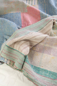Washed vintage kantha quilt, soft pastel stripes and checks.