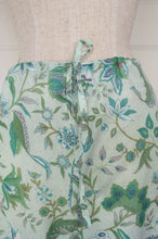 Load image into Gallery viewer, Juniper Hearth cotton voile pyjamas,This Juniper Hearth kimono is screen printed with large aqua, teal and green flowers on a stippled pale blue background.