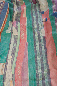 Striped and patched multi coloured vintage kantha quilt, heavy weight finely stitched.