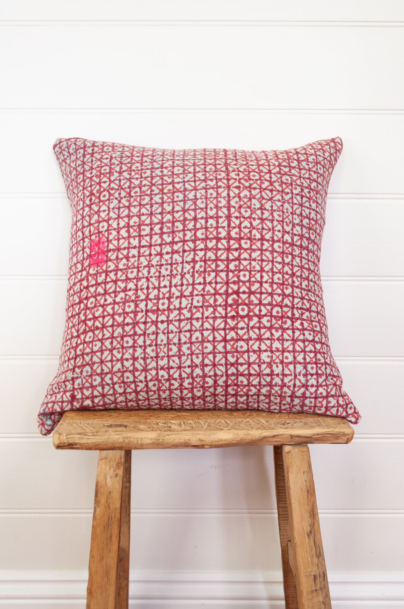 Vintage kantha quilt blockprinted square cushion in red and white checks.