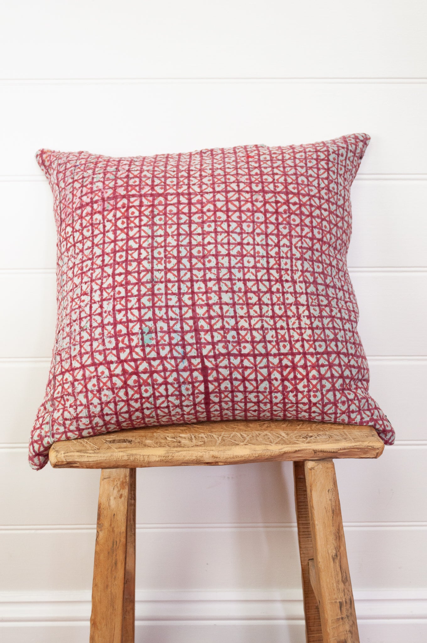 Vintage kantha quilt blockprinted square cushion in red and white checks.