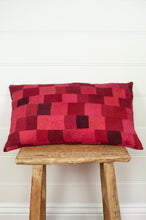 Load image into Gallery viewer, Vintage silk patchwork kantha bolster cushion is in rich tones of rose pink and red, with a dash of magenta
