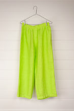 Load image into Gallery viewer, Haris Cotton lime green cropped linen pants with elastic waist, side pockets and rear patch pockets.