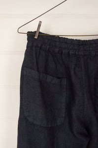 Haris Cotton blue marine navy cropped linen pants with elastic waist, side pockets and rear patch pockets.