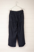 Load image into Gallery viewer, Haris Cotton blue marine navy cropped linen pants with elastic waist, side pockets and rear patch pockets.