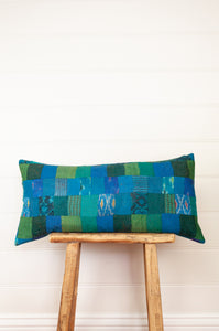 Vintage silk patchwork vibrant shades of aquamarine, turquoise, blue, emerald green and lime green, with a touch of ikat.