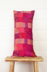 Vintage silk patchwork shades of ruby red and magenta pink and rose.
