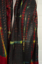 Load image into Gallery viewer, Neeru Kumar fine wool shibori dyed scarf in red black and yellow with highlights of blue.