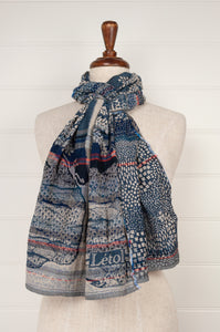 Létol made in France organic cotton jacquard woven scarf in Flavie, tree of life print in shades of denim blue and stone with highlights in vermilion.