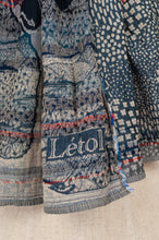Load image into Gallery viewer, Létol made in France organic cotton jacquard woven scarf in Flavie, tree of life print in shades of denim blue and stone with highlights in vermilion.