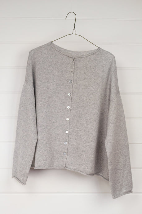 Juniper Hearth ash grey marle reversible one size cashmere cardigan, roll neck edges to neck, sleeves and hem, shell buttons, can be worn as a cardigan or reversed as a sweater.