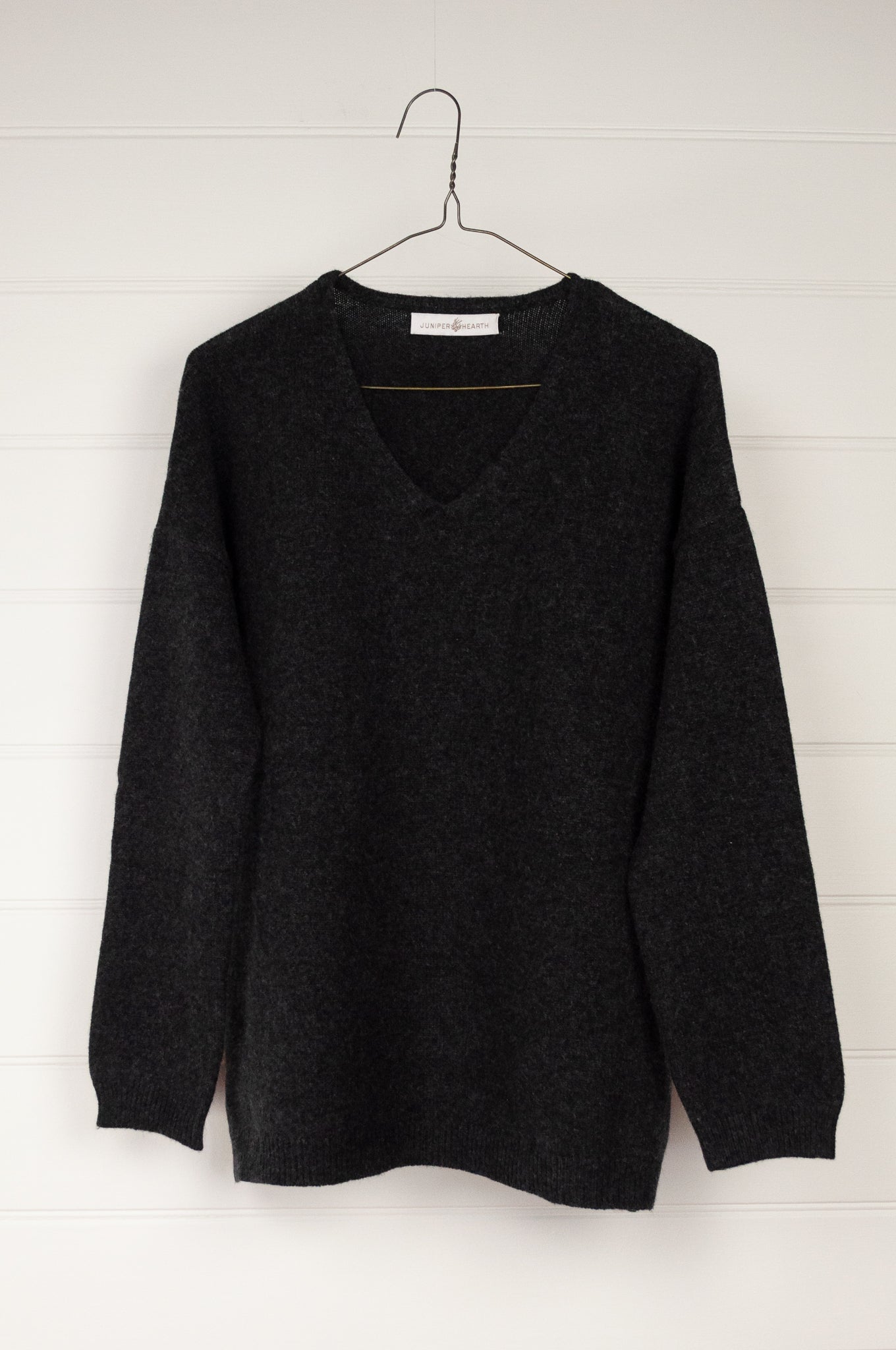 Juniper Hearth classic V neck sweater in pure cashmere, dark charcoal grey, easy fit with side slits.