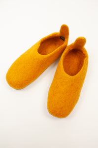 Mustard yellow wool felt slippers, pull on style with tab, fair trade and ethically made in Nepal.