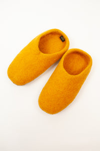 Mustard yellow wool felt slippers, slip on style, fair trade and ethically made in Nepal.