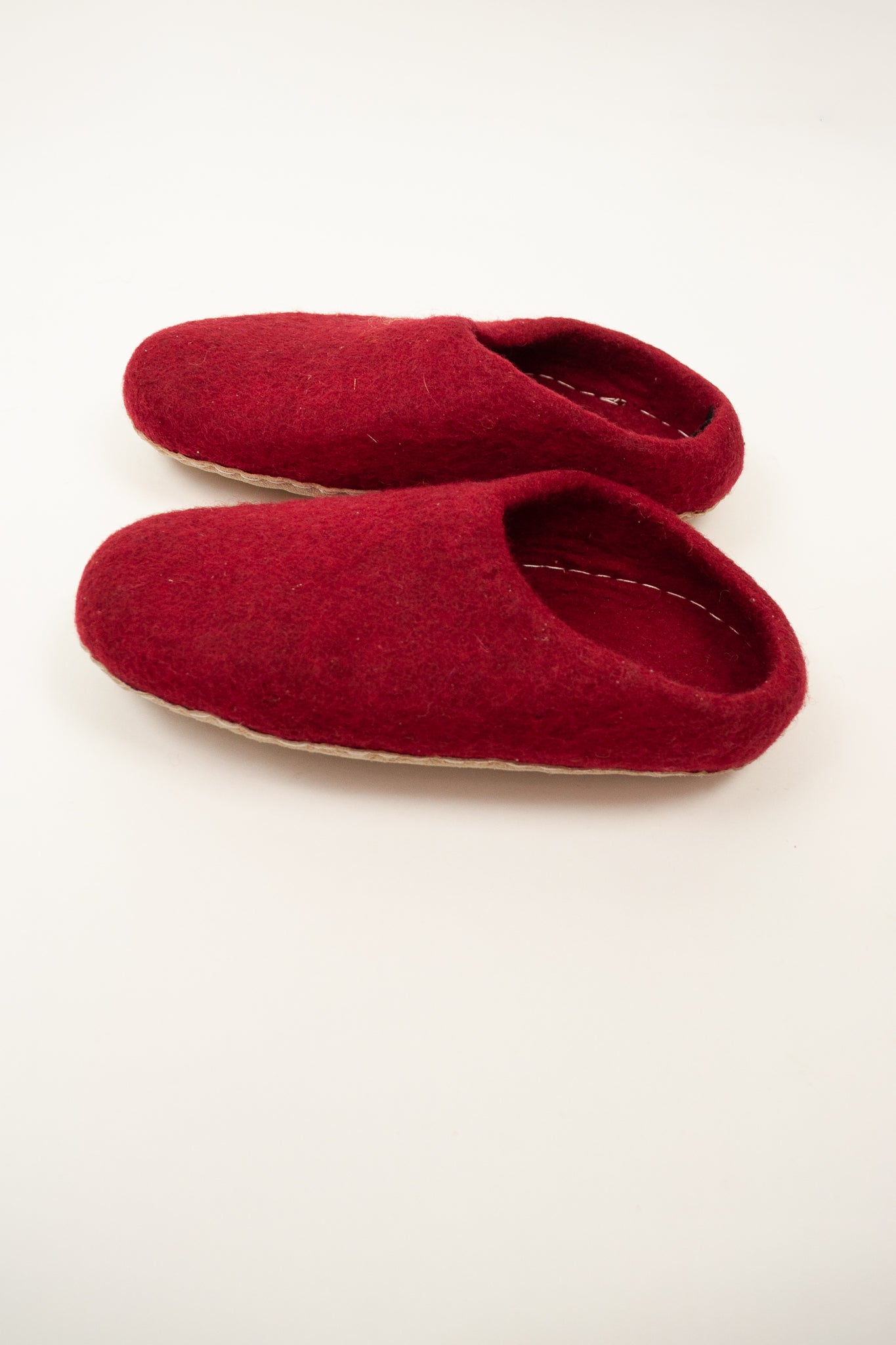Crimson wool felt slippers, slip on style, fair trade and ethically made in Nepal.