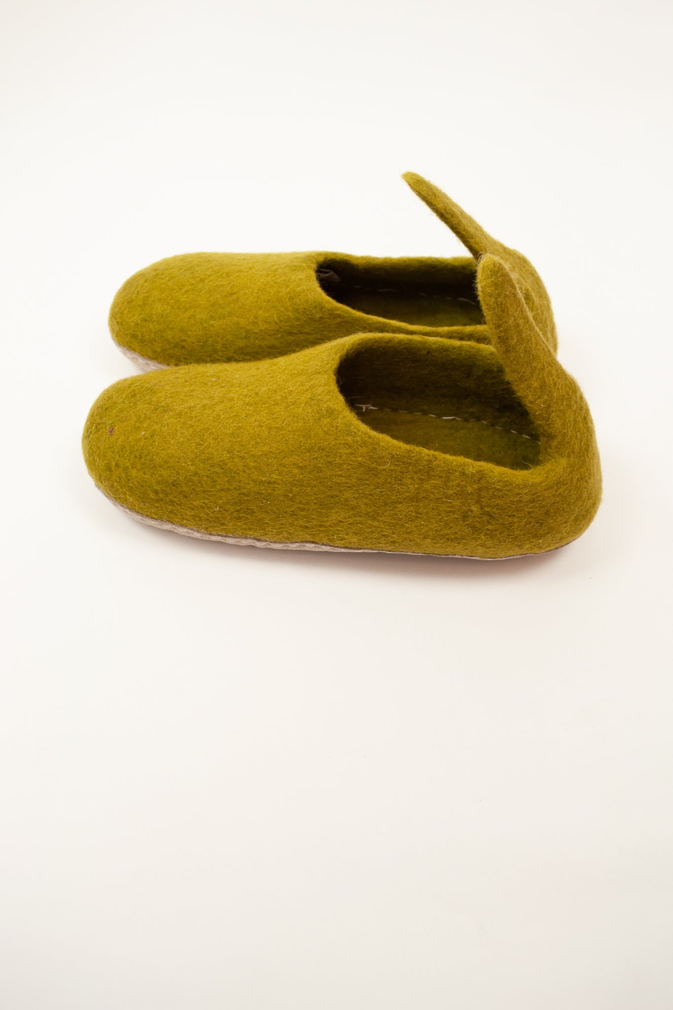 Olive green wool felt slippers, pull on style with tab, fair trade and ethically made in Nepal.