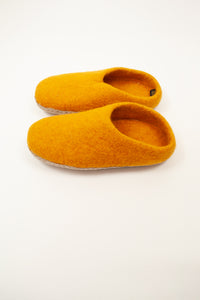 Mustard yellow wool felt slippers, slip on style, fair trade and ethically made in Nepal.