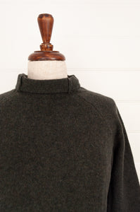 Eribe made in Scotland pure lambswool merino wool Corry raglan sweater, relaxed fit, roll neck, in Seaweed, deep olive green.