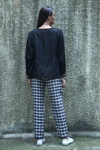 Dve elastic waist easy fit Rooma pants in black white and brown plaid linen.