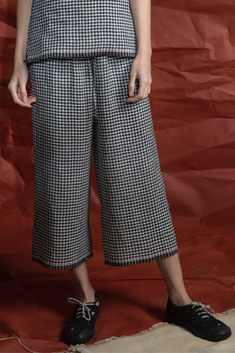 DVE Dityaa black and white check gingham linen wide leg pants.