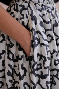 Runaway Bicycle Gina skirt, white handloom silk with black abstract floral blockprint.