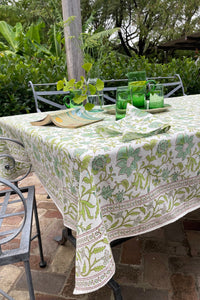 Cotton table cloth, blockprinted by hand exclusively for Juniper Hearth, Mina floral in turquoise and lime green on white.